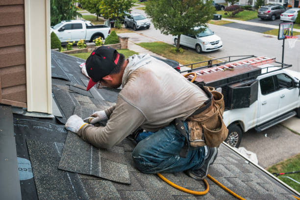 Professional Emergency Roof Repair technician working in New Suffolk, NY